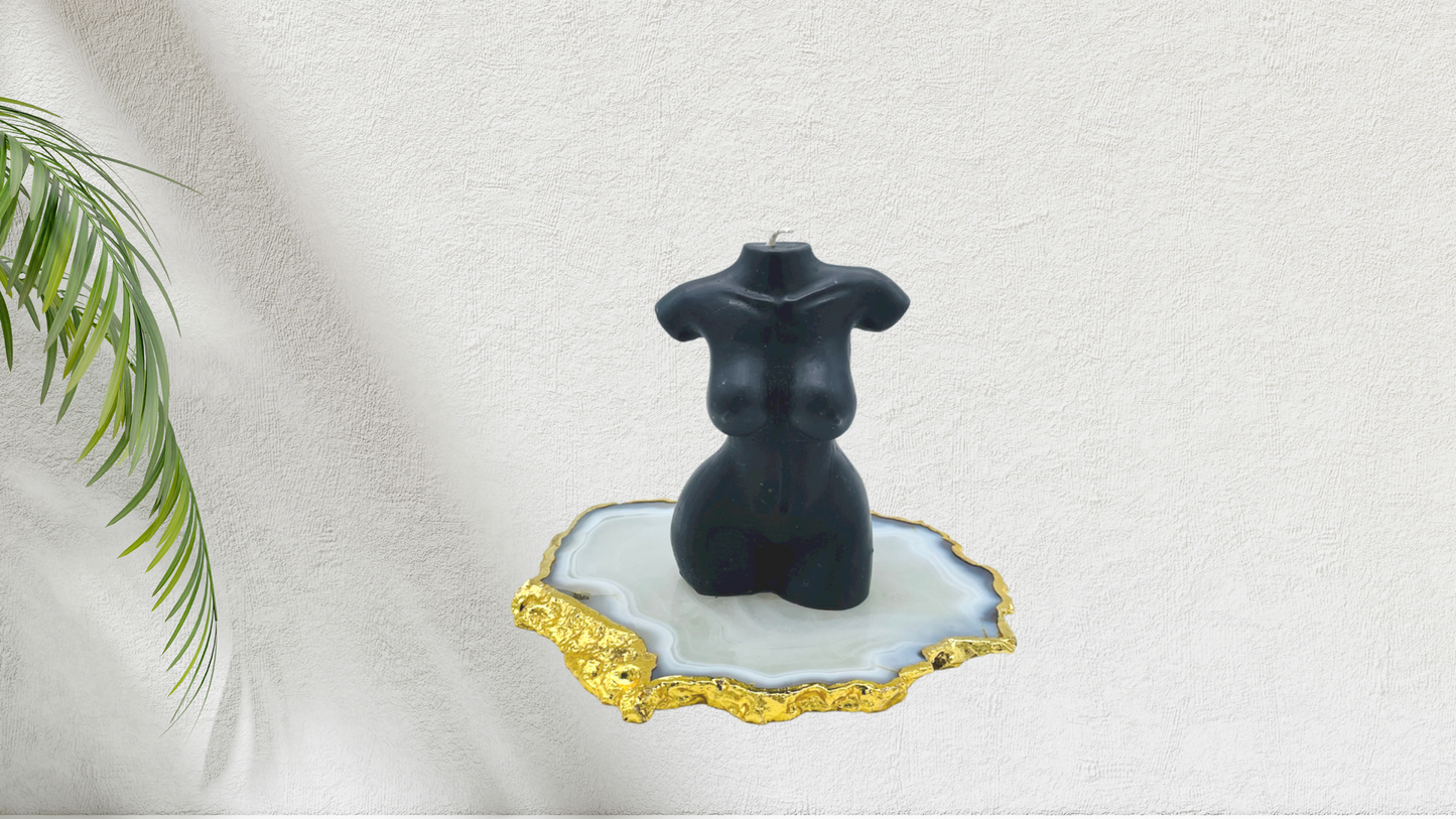 Scented female torso candle in black. Cruelty-free and vegan, made with soy wax.  
